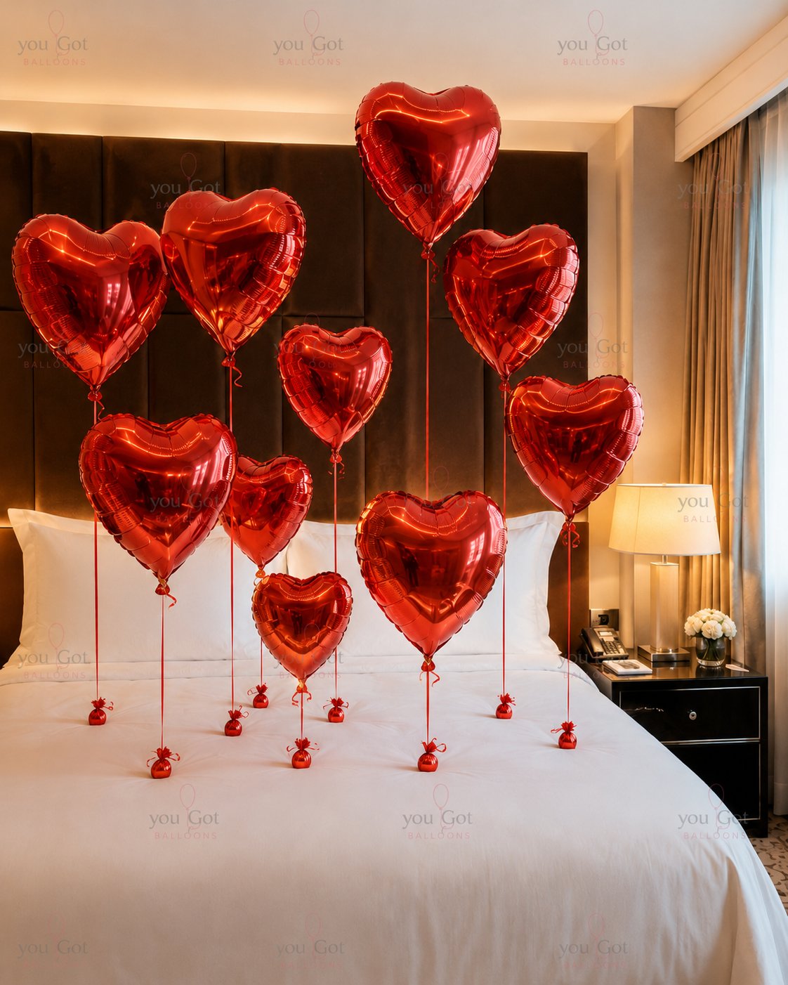 Valentines and anniversary hotel room setup with red heart balloons in Dubai