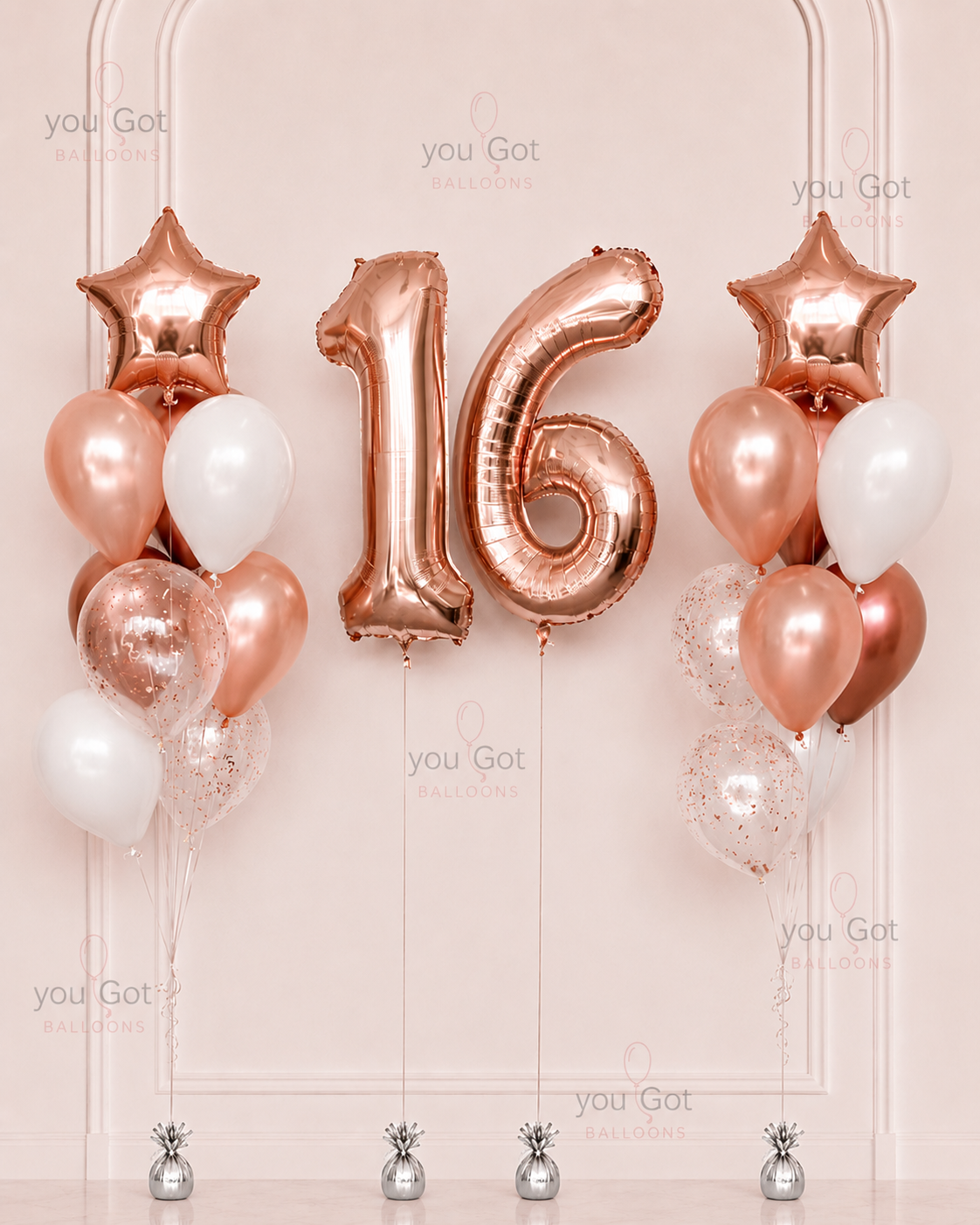 Rose gold balloons with number '16'