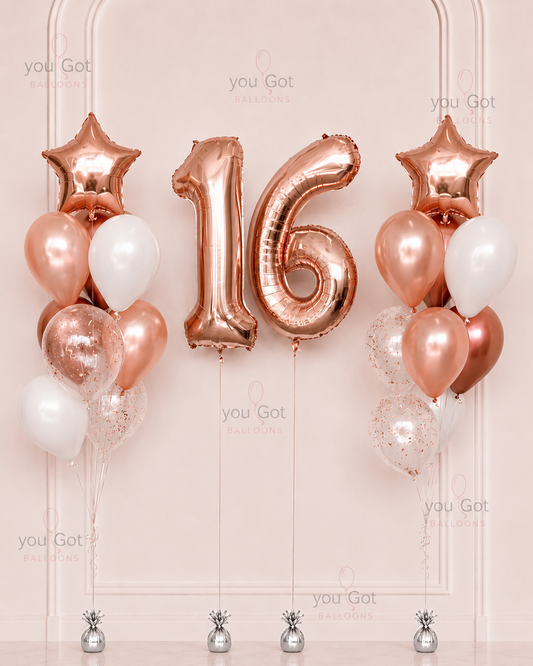 Rose gold balloons with number '16'