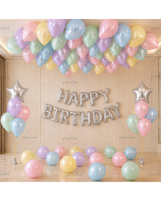 50 pastel ceiling birthday balloon setup with silver star balloons in Dubai