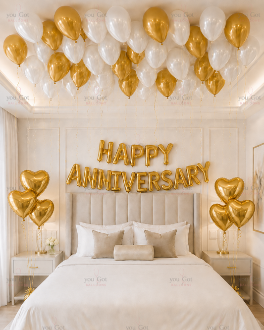 Happy Anniversary Setup with Hearts Gold and White for romantic anniversary balloon decoration in Dubai