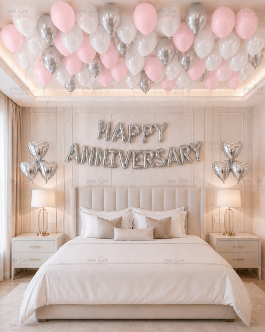 Happy Anniversary Setup with Hearts Pink and Silver for romantic anniversary balloon decoration in Dubai